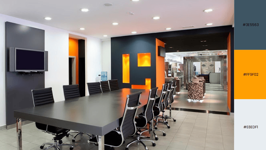 Modern conference room design with sleek gray, orange accents, and bold "H" wall feature