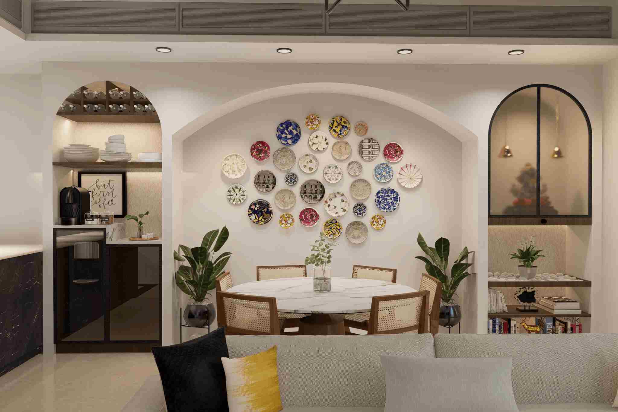 The dining room has a plate wall, wooden chairs, and modern shelves for decoration.