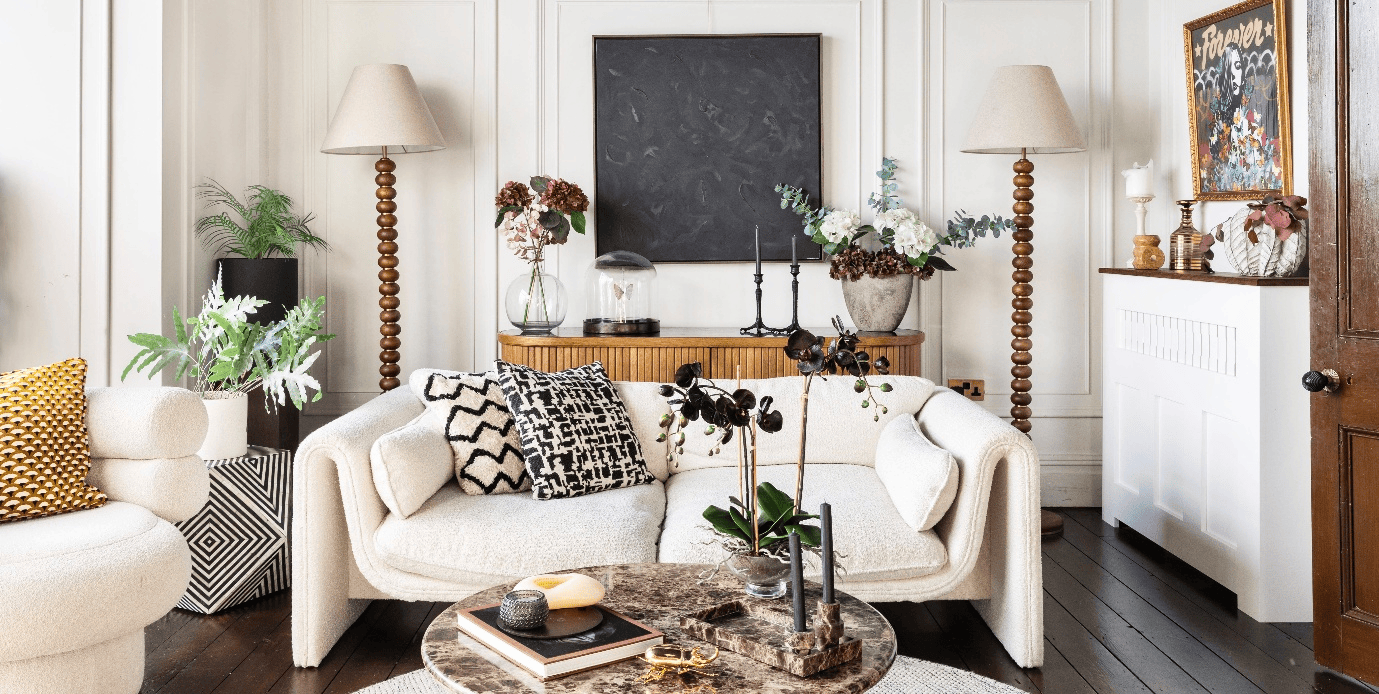 stylish textured setup using art plants and layered decor to enhance the living room beautifully