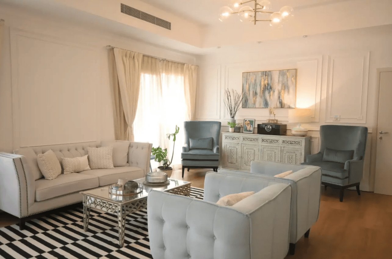 chic living room with soft pastels and clean lines exudes calm and gently lifts your mood