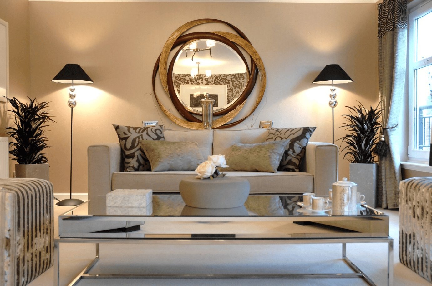 luxurious setup with metallic accents and symmetry to enhance the living room with sophistication