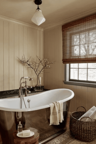 Use a Metallic Tub and Warm Accents