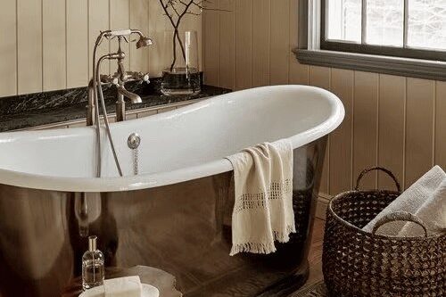 Use a Metallic Tub and Warm Accents Small Bathroom Design Ideas