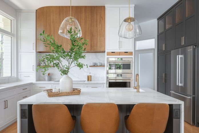 Japandi Kitchen design in light oak cabinets with matte quartz countertops